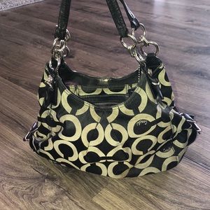 Black and grey (purple inside ) coach purse